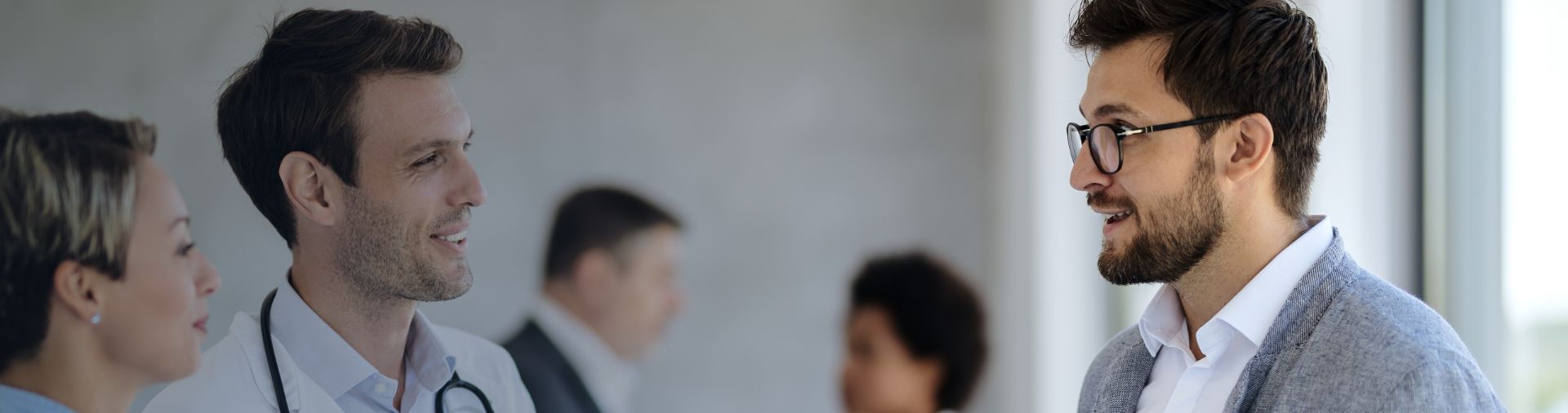 Doctors talking to patient